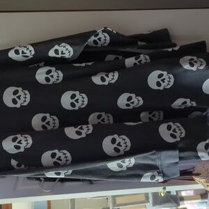 Women's skull scoop neck sweater.